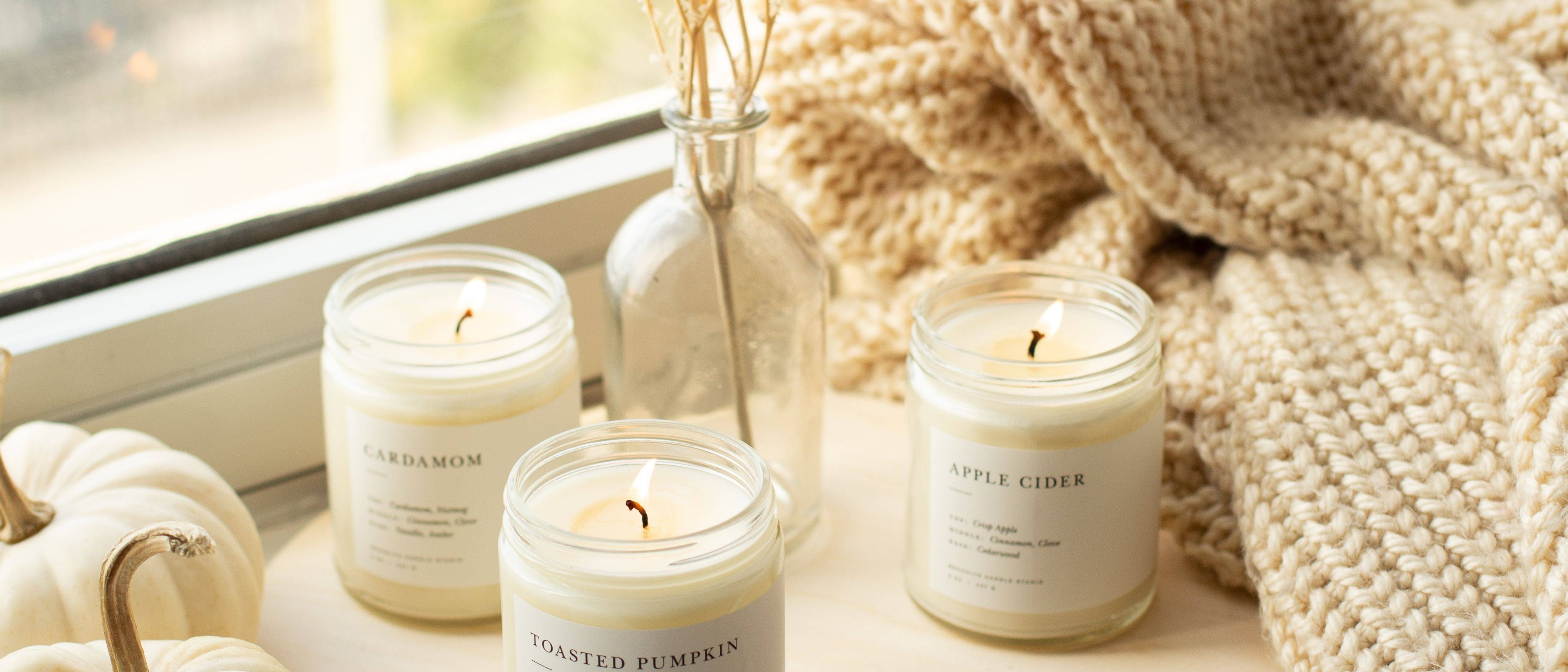 High-quality scented candles at the window